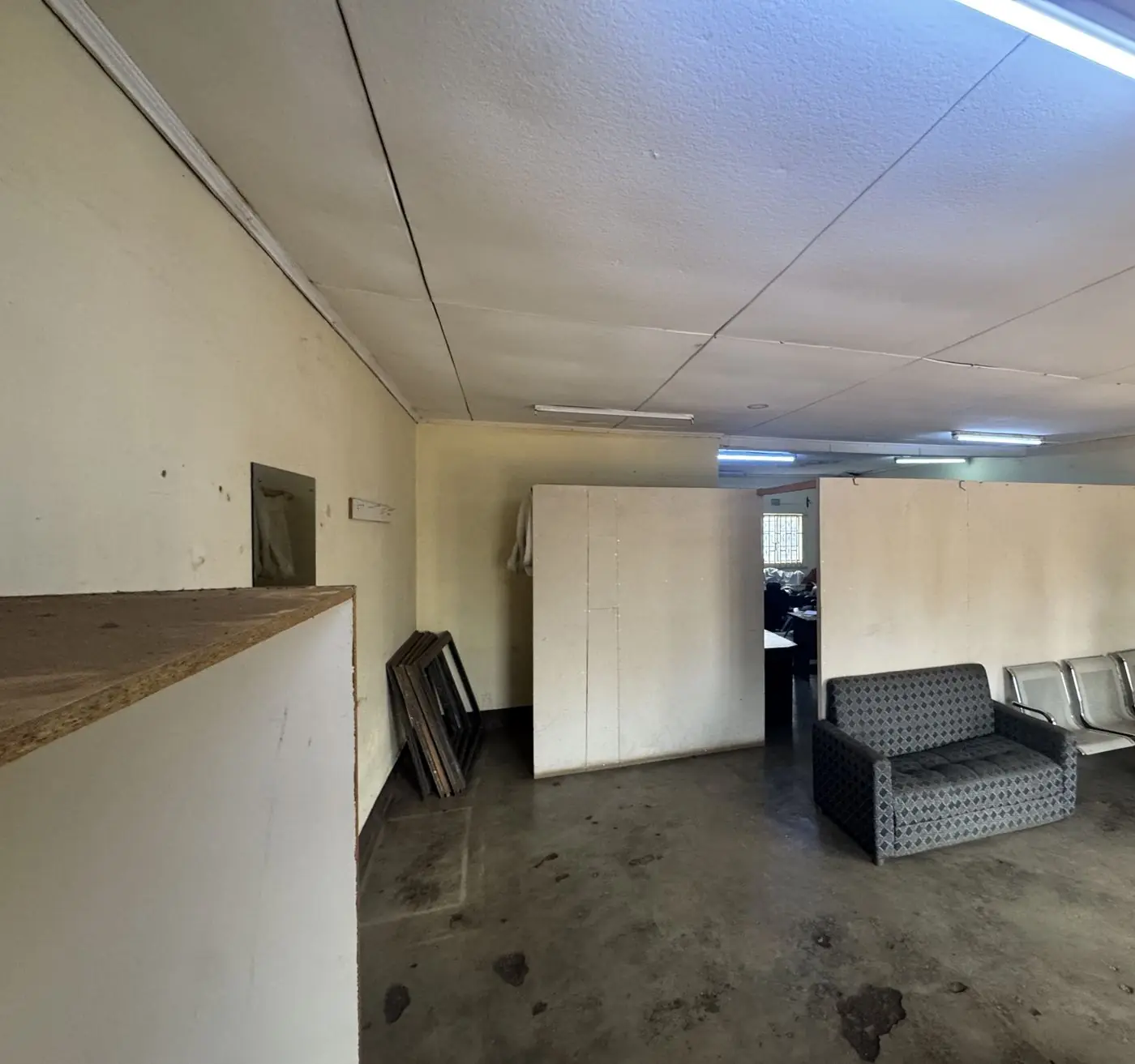 Office with ageing partitions and ceiling boards